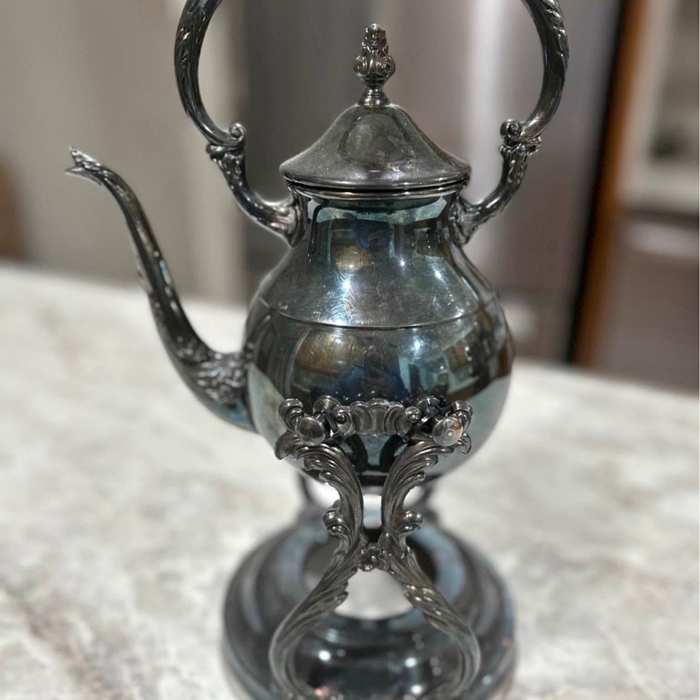 Elegant Silver Teapot with Stand